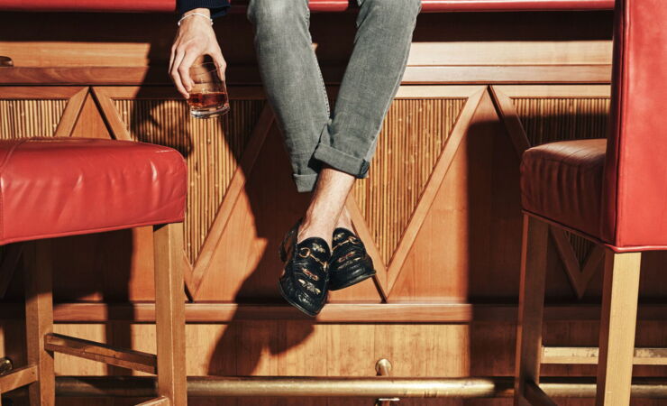 Man with rum sitting on the bar